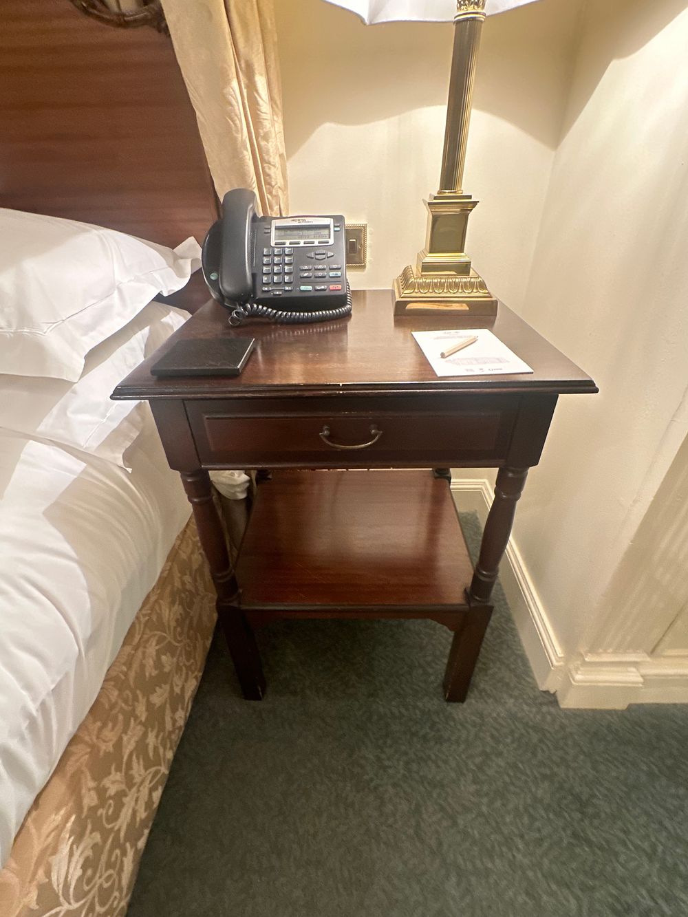 Lot 1270: A Pair of 20th Century Revival Style Dark-Stained Wood Bedside Tables