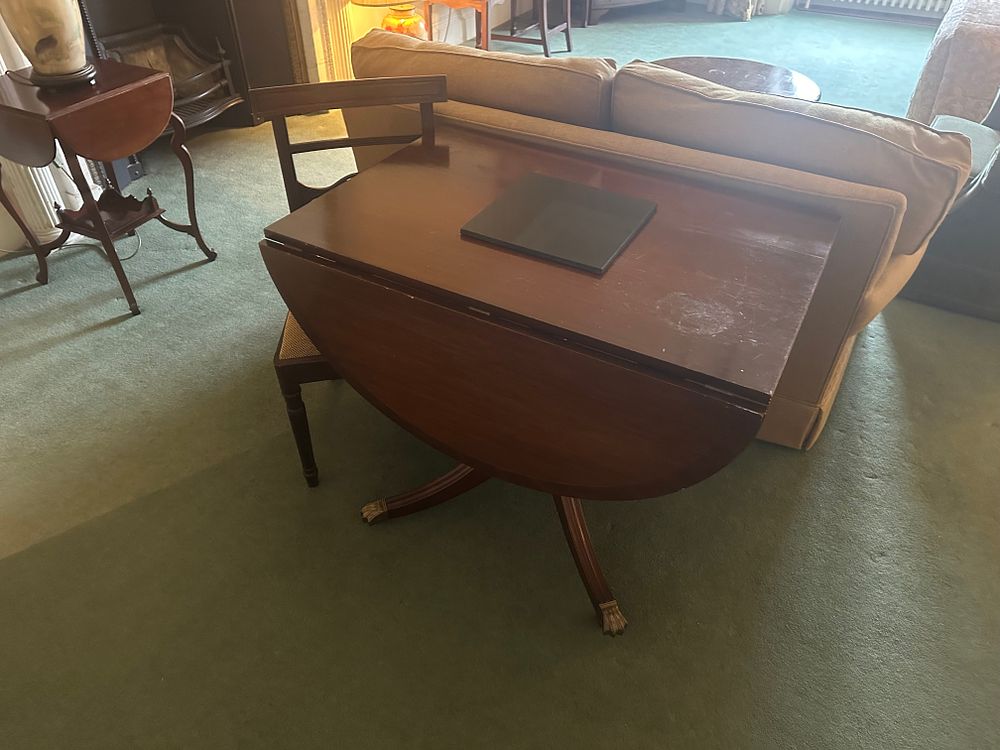 Lot 1305: A Duncan Phyfe Style Mahogany Drop-Leaf Table and a Neoclassical Style Side Chair