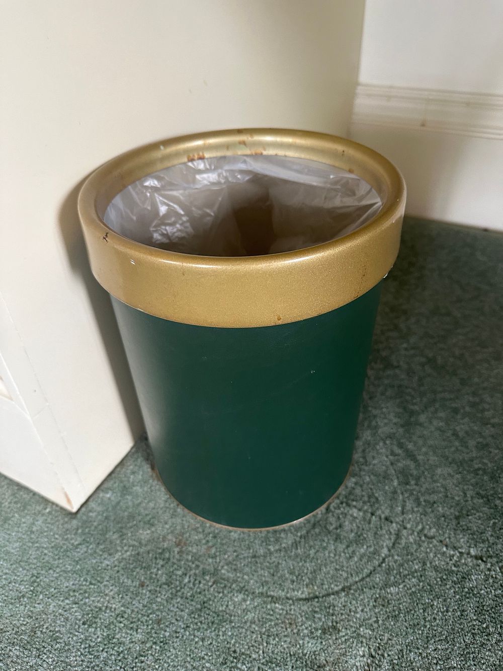Lot 1324: A Contemporary Dark Green Waste Bin with Gold-Toned Rim