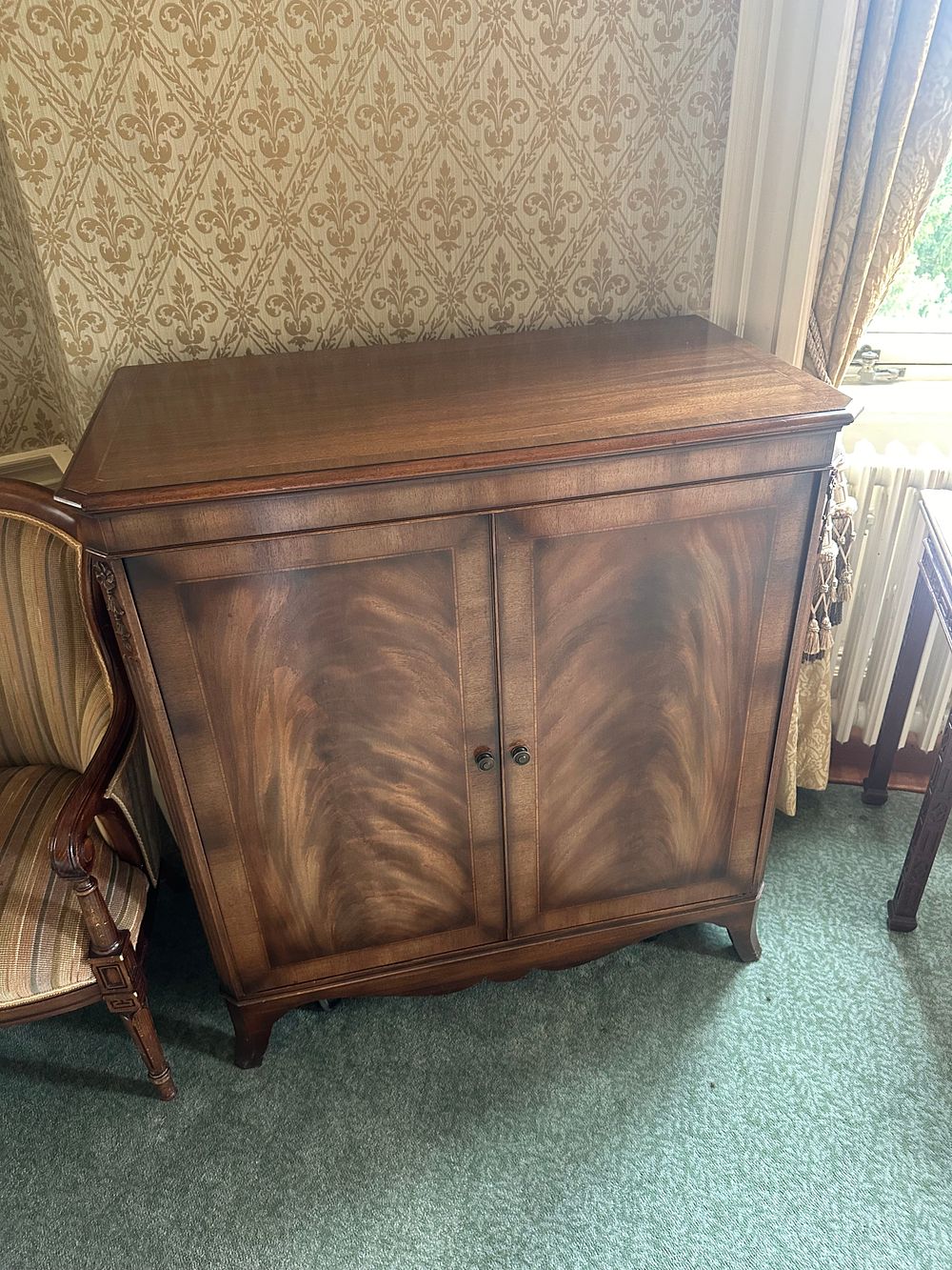 Lot 1336: A Flame Mahogany Veneered Cabinet