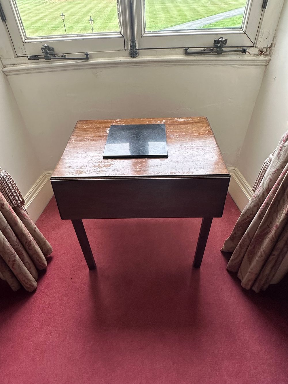 Lot 1368: A Regency Style Hardwood Drop-Leaf Table with Inset Stone Panel