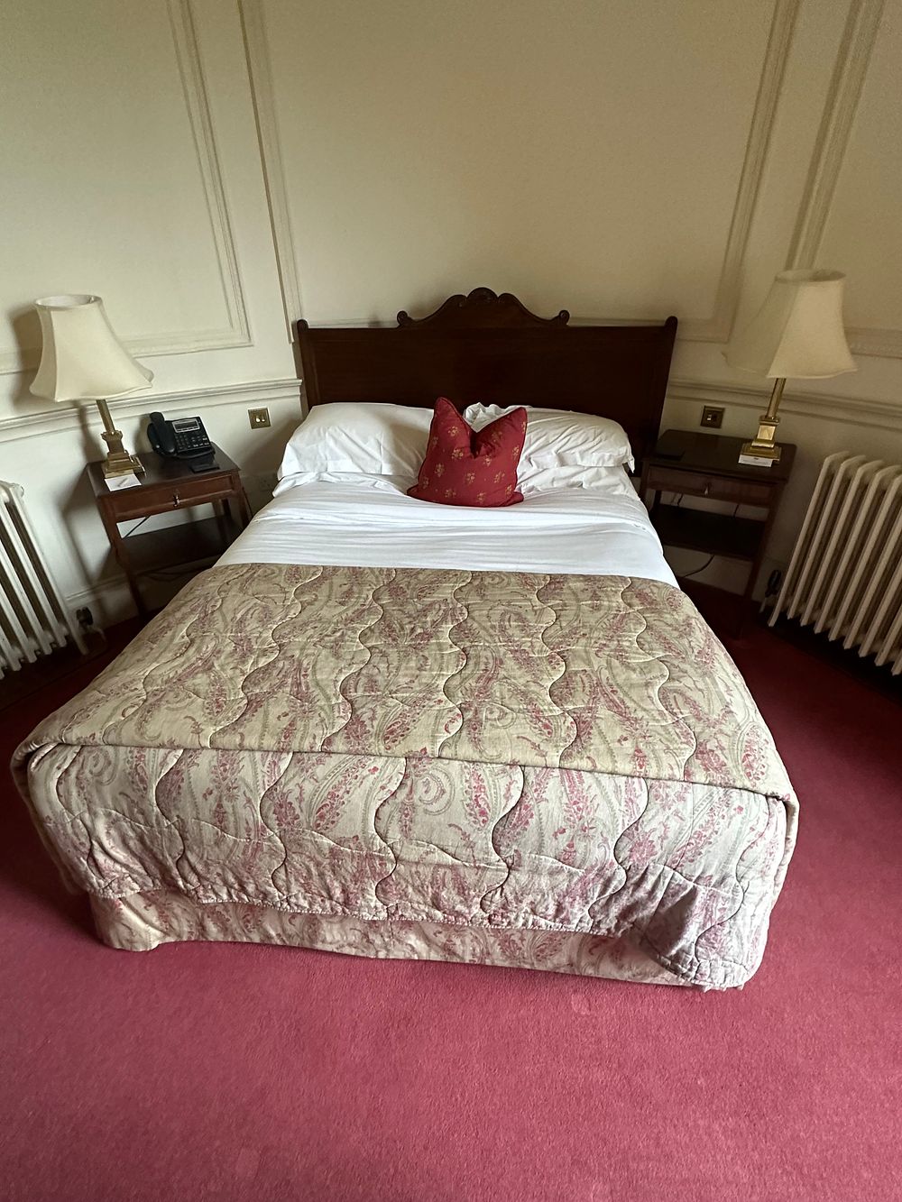 Lot 1369: A Late Victorian/Edwardian Style Carved Dark Wood Bed, 150 x 200cm, with A Pair of Bedside Tables and Lamps