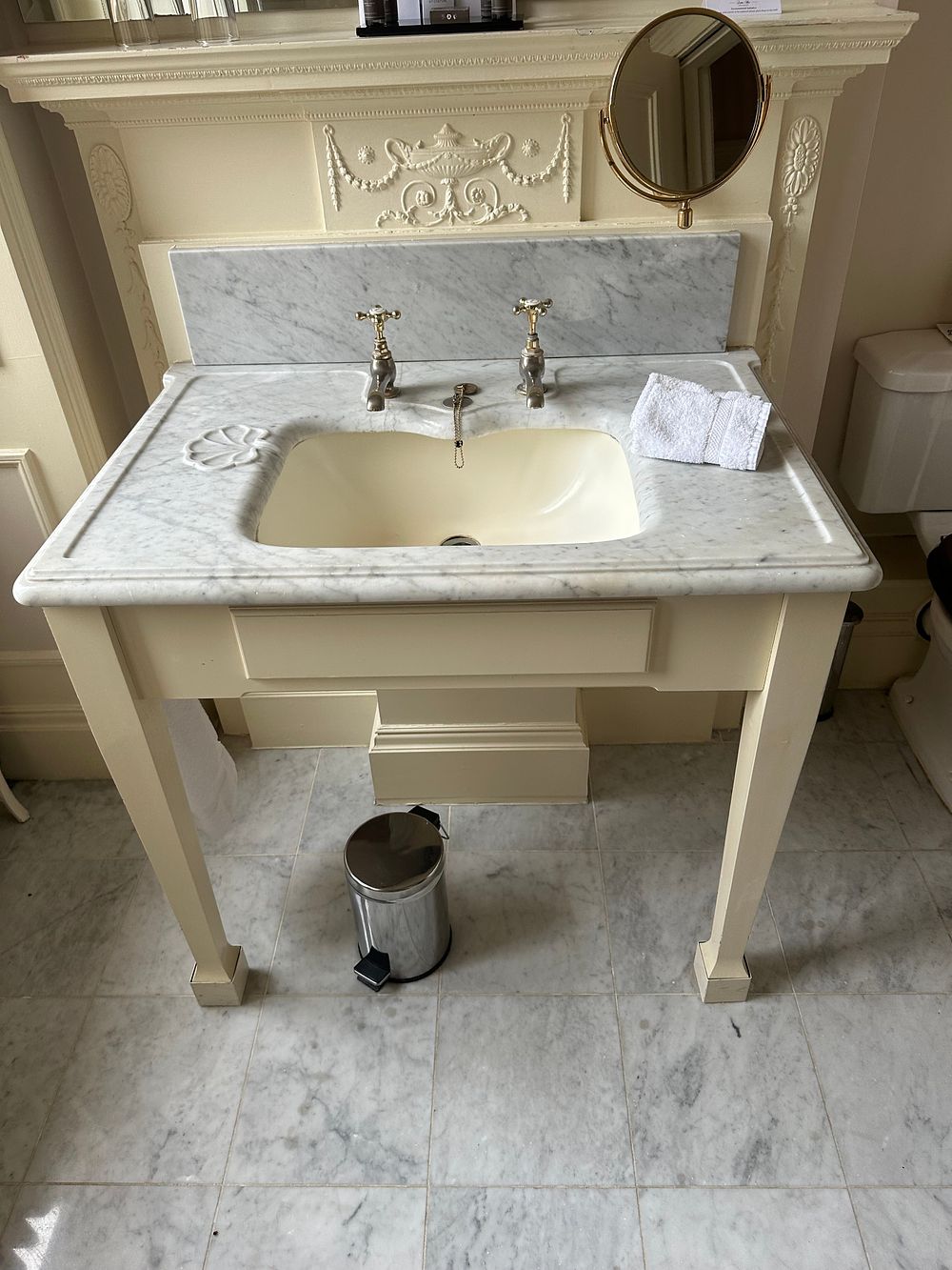 Lot 1378: A Classical Revival Style Marble and Painted Wood Console Washstand