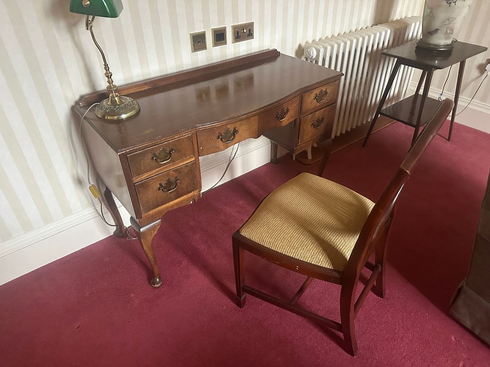 Lot 1396: A Queen Anne Style Kneehole Writing Desk and a Hepplewhite Style Shield-Back Chair