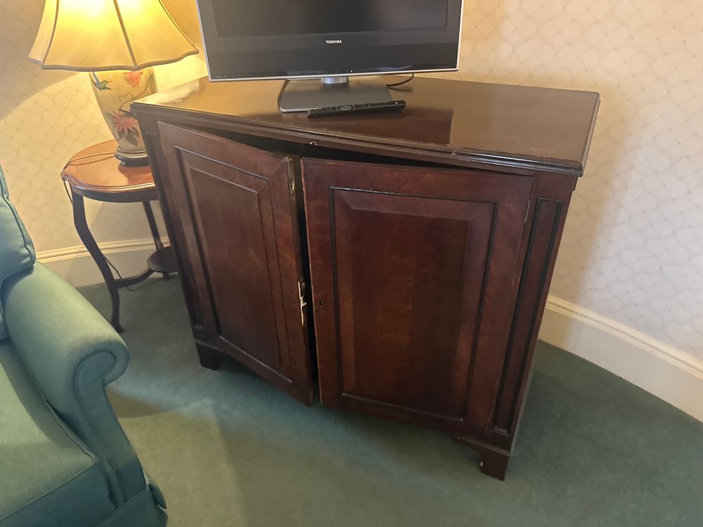 Lot 1436: A Traditional Style Dark-Stained Wood Cabinet, Housing a Mini-Refrigerator, with a Toshiba 'REGZA' LCD Television