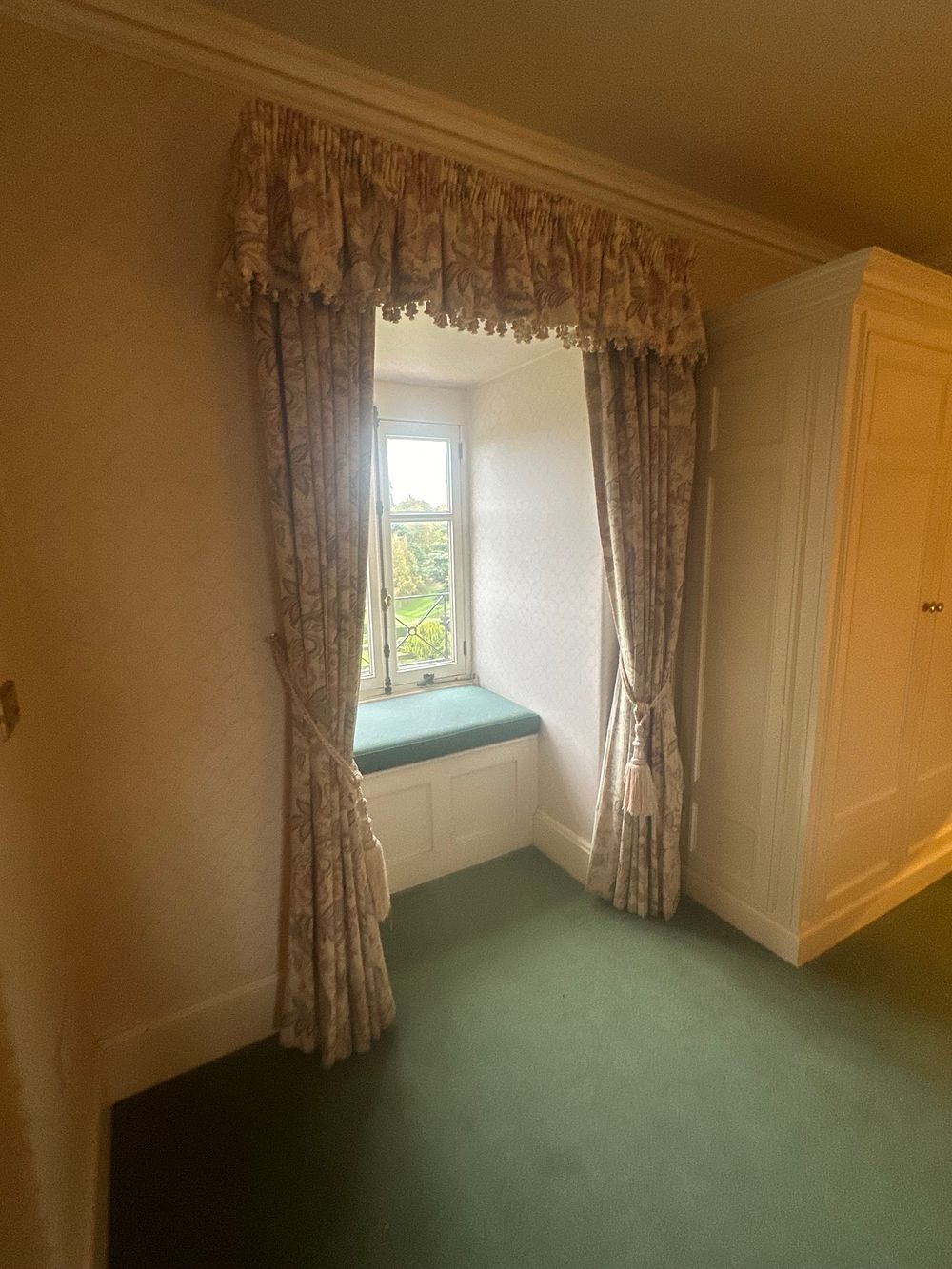 Lot 1440: A Pair of Custom-Fitted Chinoiserie or Jacobean Style Floral and Foliate Curtain Panels with Valance and Tie-Backs