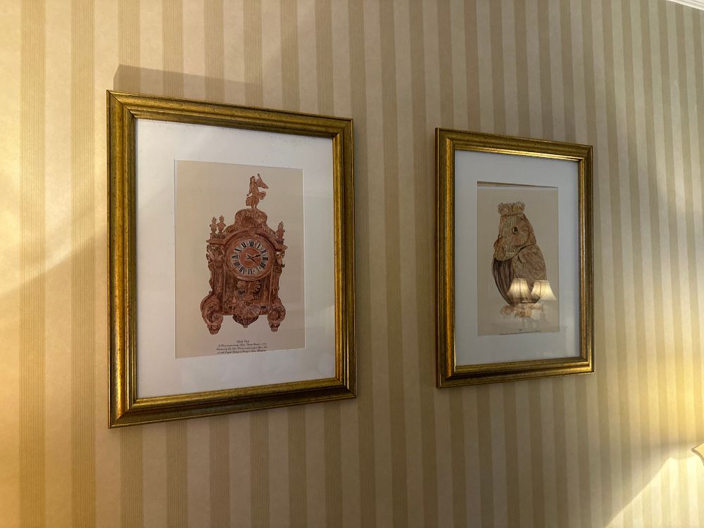Lot 1449: A Pair of Sepia-Toned Prints, one depicting a French Bracket Clock, the other a Meissen Owl Tureen
