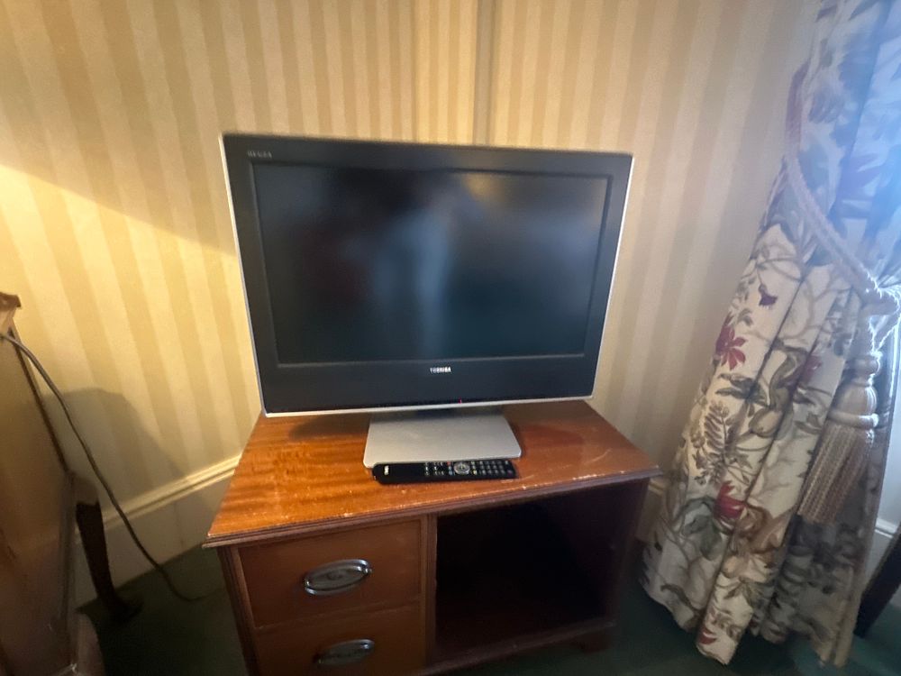 Lot 1468: A Toshiba 26WLT66S Flat-Screen Television with Remote Control