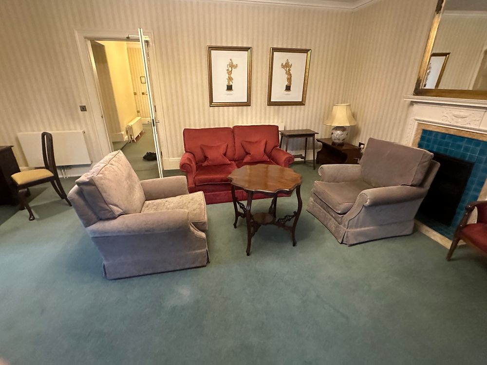 Lot 1513: A Suite of Upholstered Seating and Occasional Tables, comprising a Sofa, Two Armchairs, and Three Tables