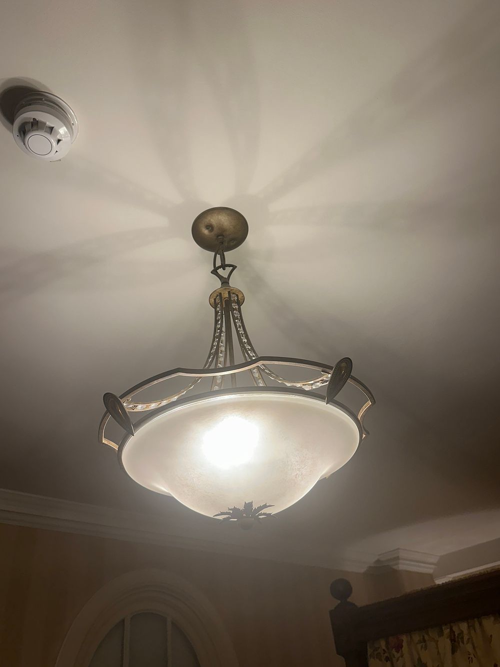 Lot 1545: A Bronze-Toned Metal and Frosted Glass Semi-Flush Mount Ceiling Light with Faceted Elements