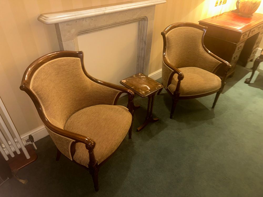 Lot 1553: A Pair of Regency Style Armchairs and an Occasional Table