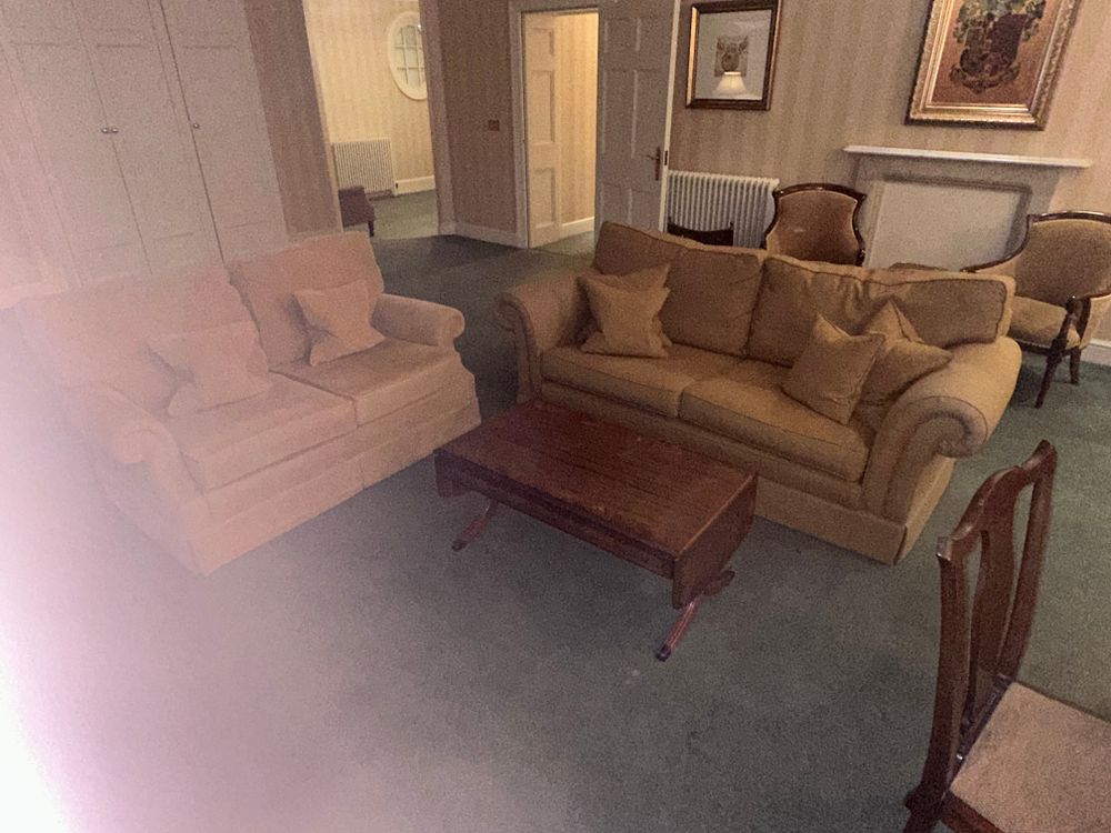 Lot 1557: A Three-Piece Sitting Room Ensemble, comprising Two Sofas and a Coffee Table