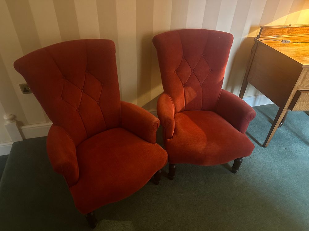 Lot 1579: A Pair of Mid 20th Century Red Velvet Upholstered Armchairs and an Octagonal Table