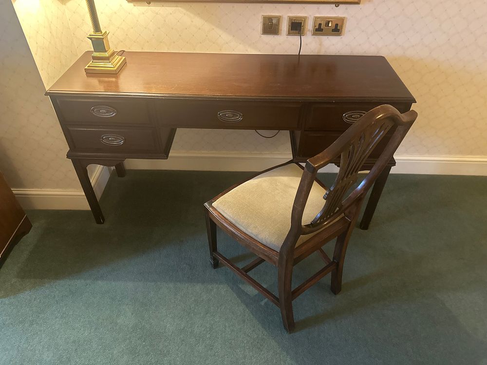 Lot 1597: A Regency Mahogany Writing Desk and Armchair, A Set of Two