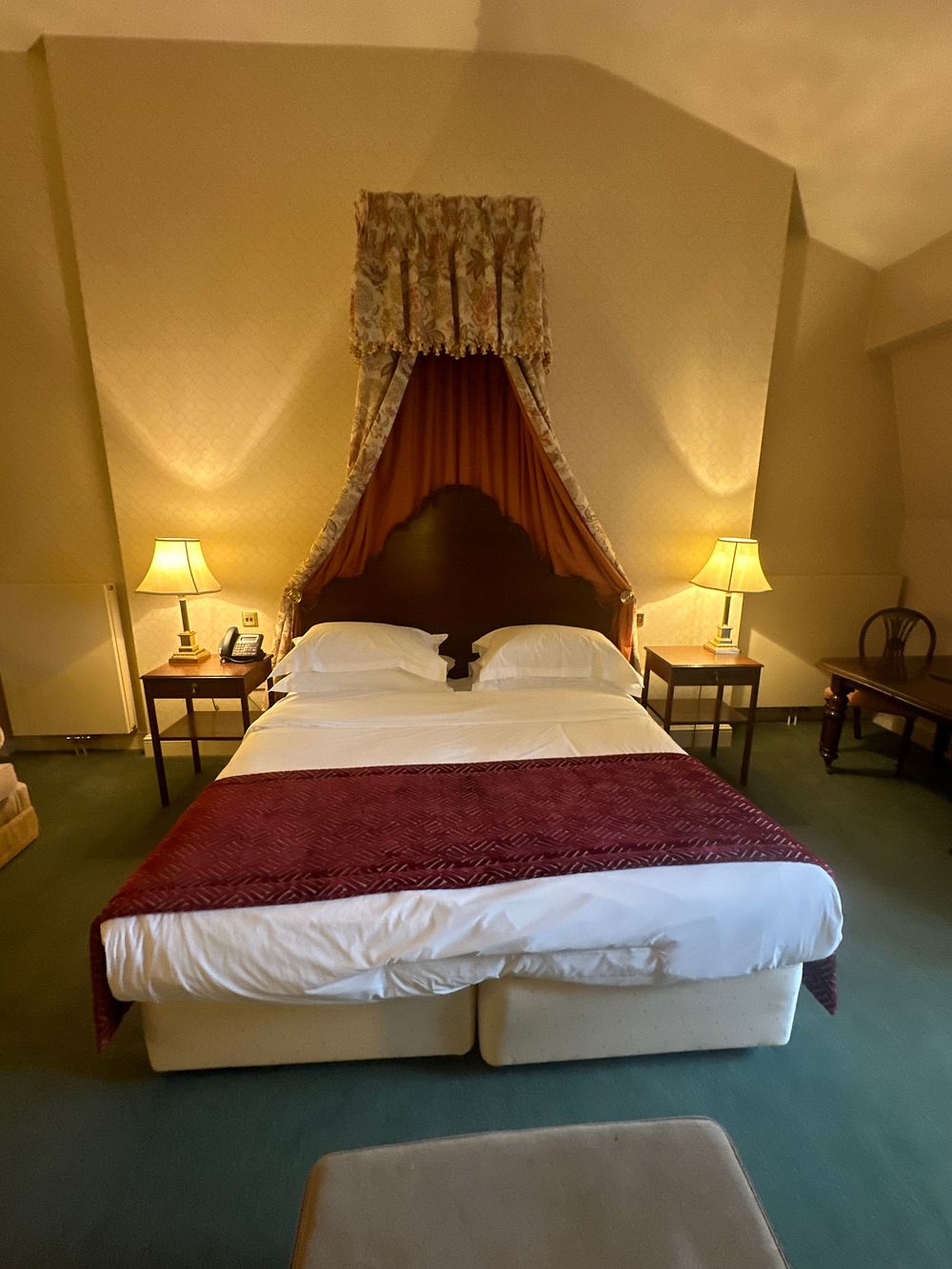 Lot 1599: A Traditional Dark Wood Bedroom Ensemble with Chintz-Style Canopy, Curtains, and Tables