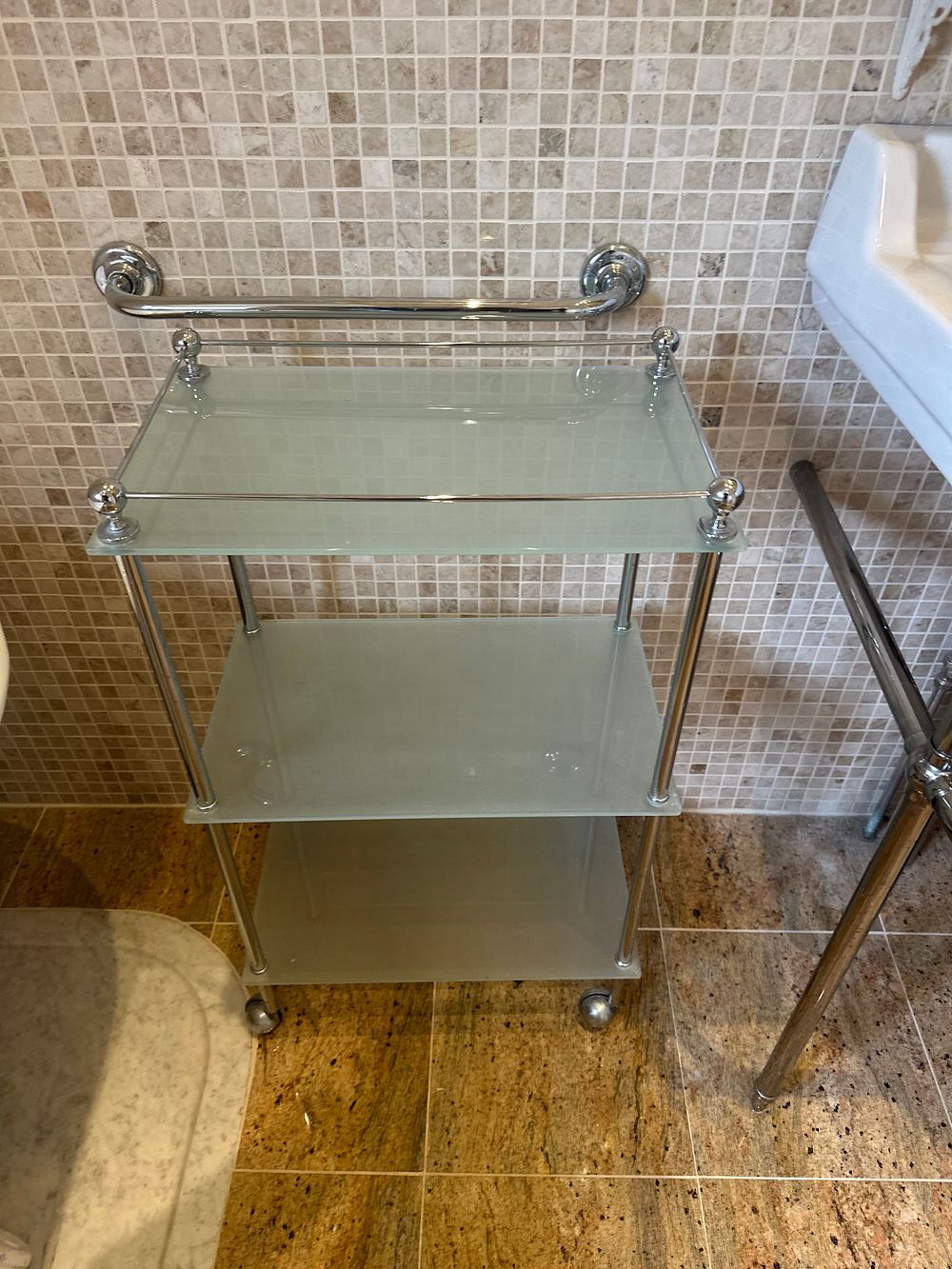Lot 1602: A Contemporary Chrome and Frosted Glass Three-Tier Rolling Utility Cart