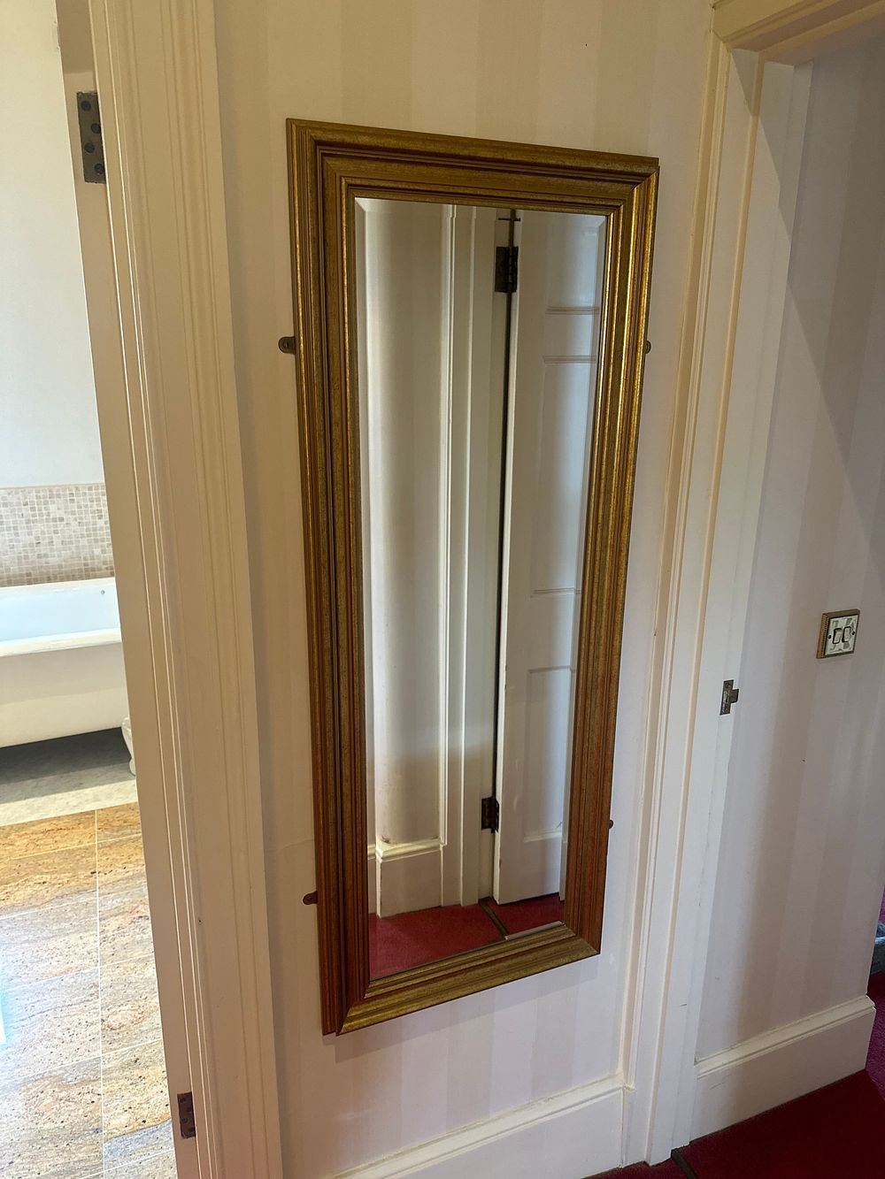 Lot 1603: A Pair of Giltwood or Gilt Composite Wall Mirrors