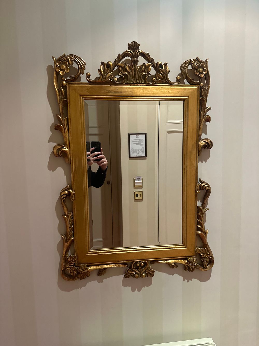 Lot 1610: A Pair of Rococo Style Giltwood Wall Mirrors