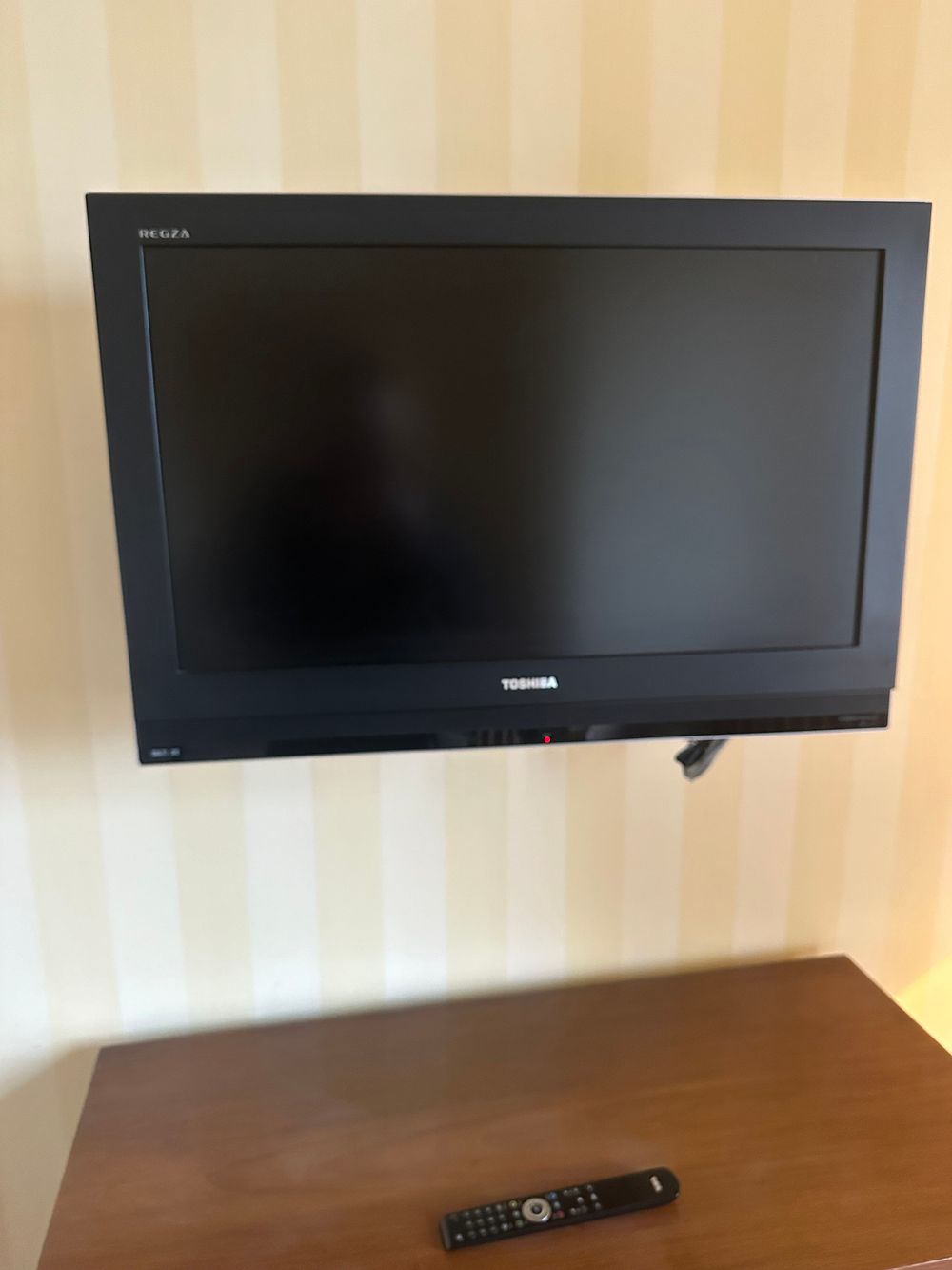Lot 1622: A Modern Toshiba REGZA Flat-Panel Television with Remote Control