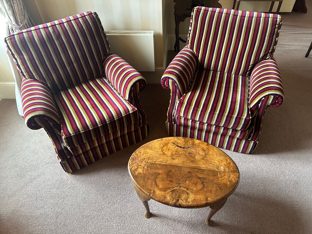 Lot 1627: A Pair of Upholstered Armchairs and an Occasional Table