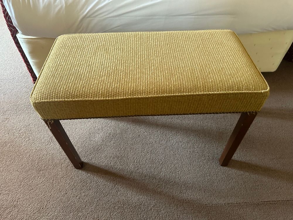 Lot 1629: A Mid-Century Style Upholstered Bench with Tapered Legs