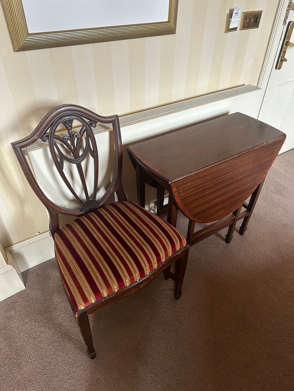Lot 1633: A Collection of Mahogany Furniture, comprising a Pembroke Table, two Occasional Tables, a Shield-Back Side Chair, and a Chest of Drawers