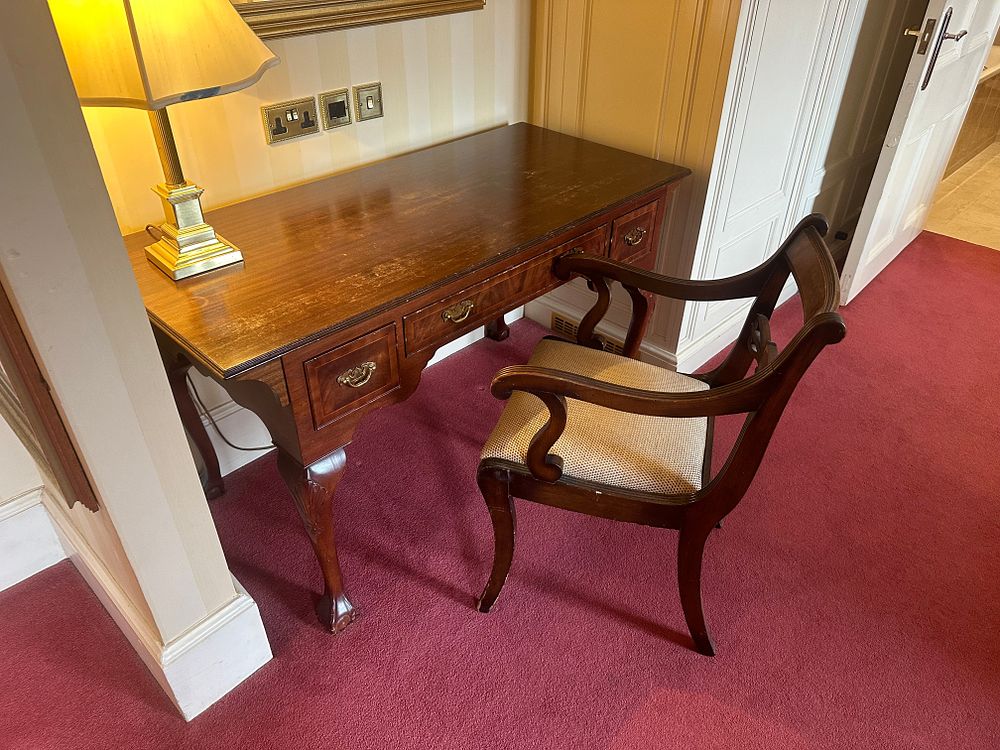 Lot 1645: A Mahogany Chippendale Style Writing Desk and a Regency Style Armchair