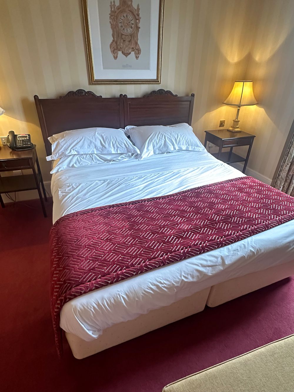 Lot 1649: A Hypnos Zip and Link Divan Bed, 180 x 200cm, with a Carved Hardwood Headboard and Complementary Furnishings