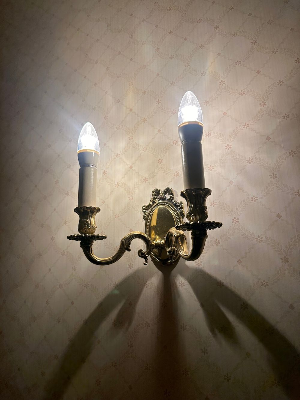 Lot 1651: An Antique French Neoclassical Gilded Brass Two-Light Wall Sconce