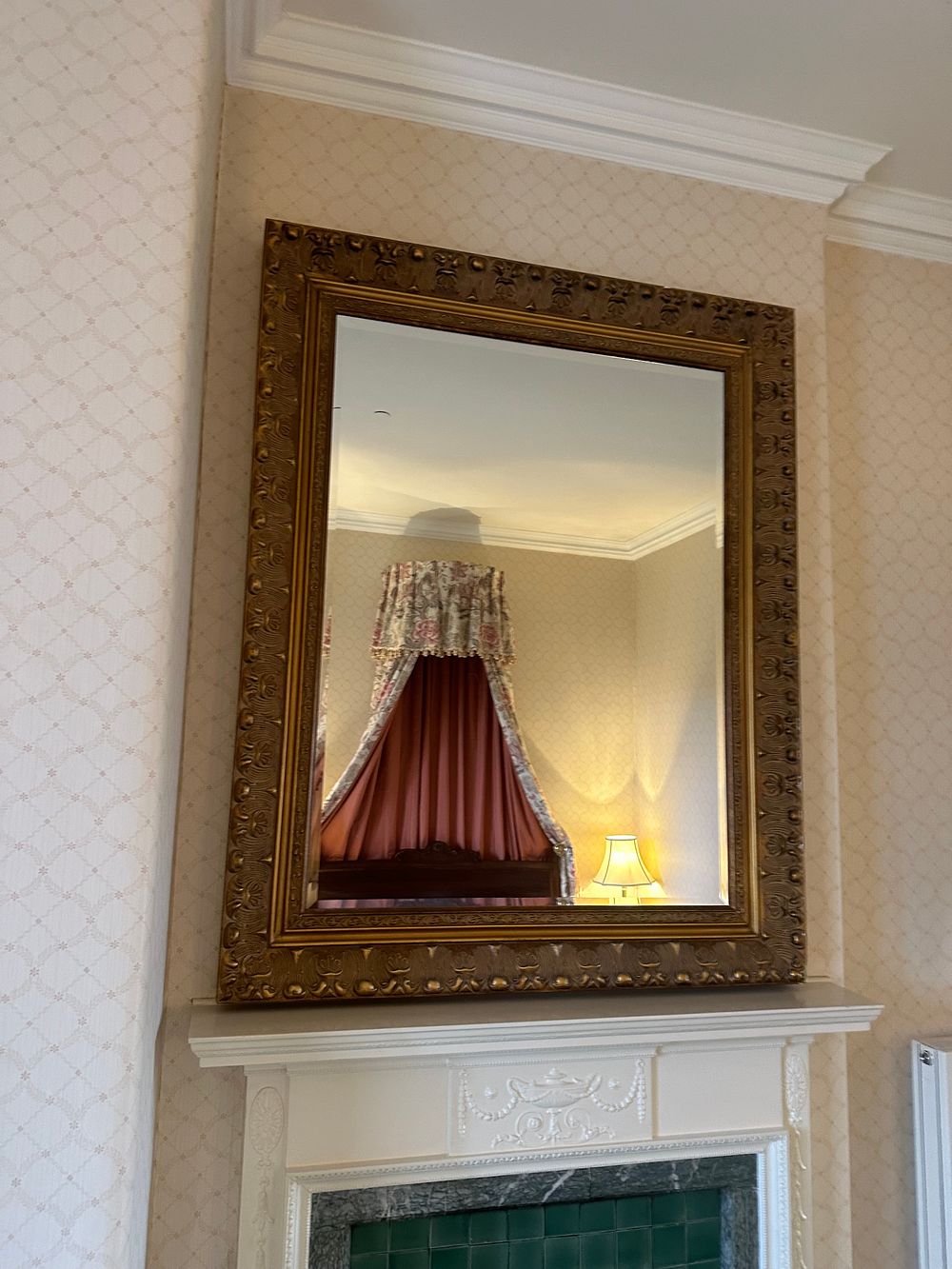 Lot 1657: A Rococo Revival Giltwood and Gesso Wall Mirror