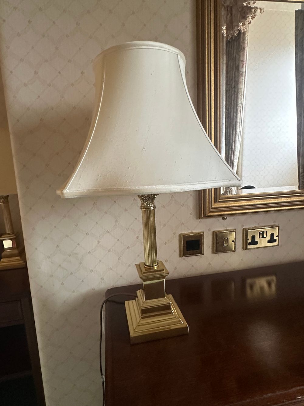 Lot 1666: Three Neoclassical Style Brass-Tone Column Table Lamps, circa 1970s-1980s