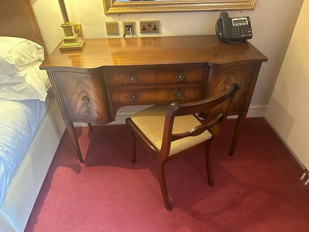 Lot 1689: A Regency Style Mahogany Serpentine-Front Desk and Chair