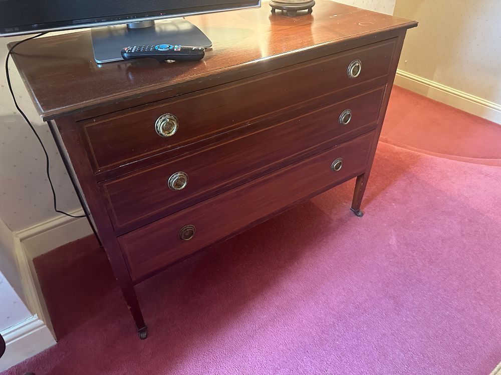 Lot 1691: A Pair of Neoclassical Walnut Chest of Drawers and Side Table