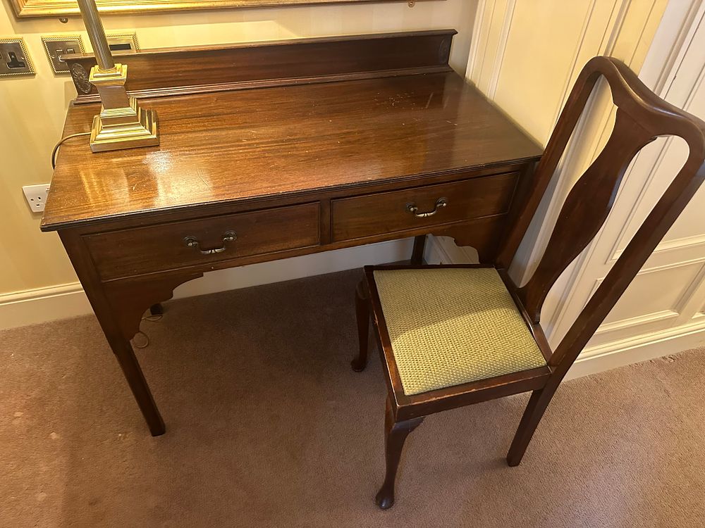 Lot 1705: A Georgian Style Dark Wood Desk and Matching Side Chair