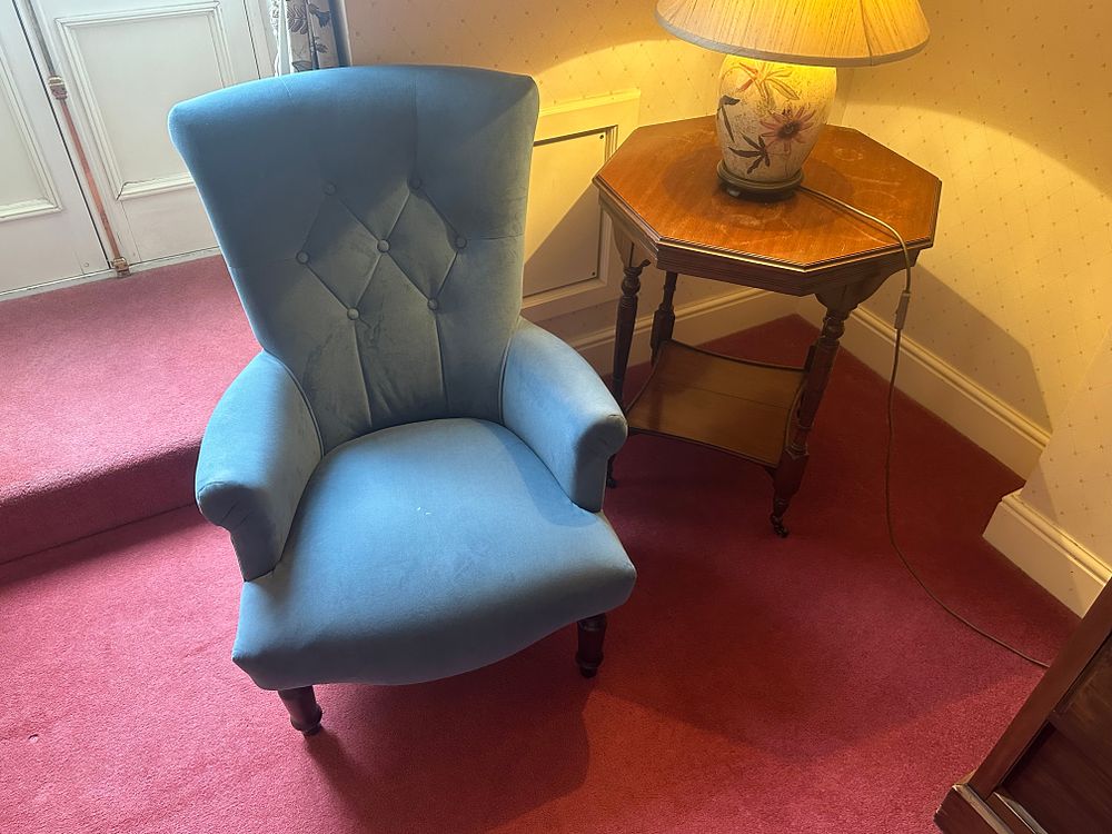 Lot 1733: A Contemporary Blue Velvet Button-Tufted Armchair