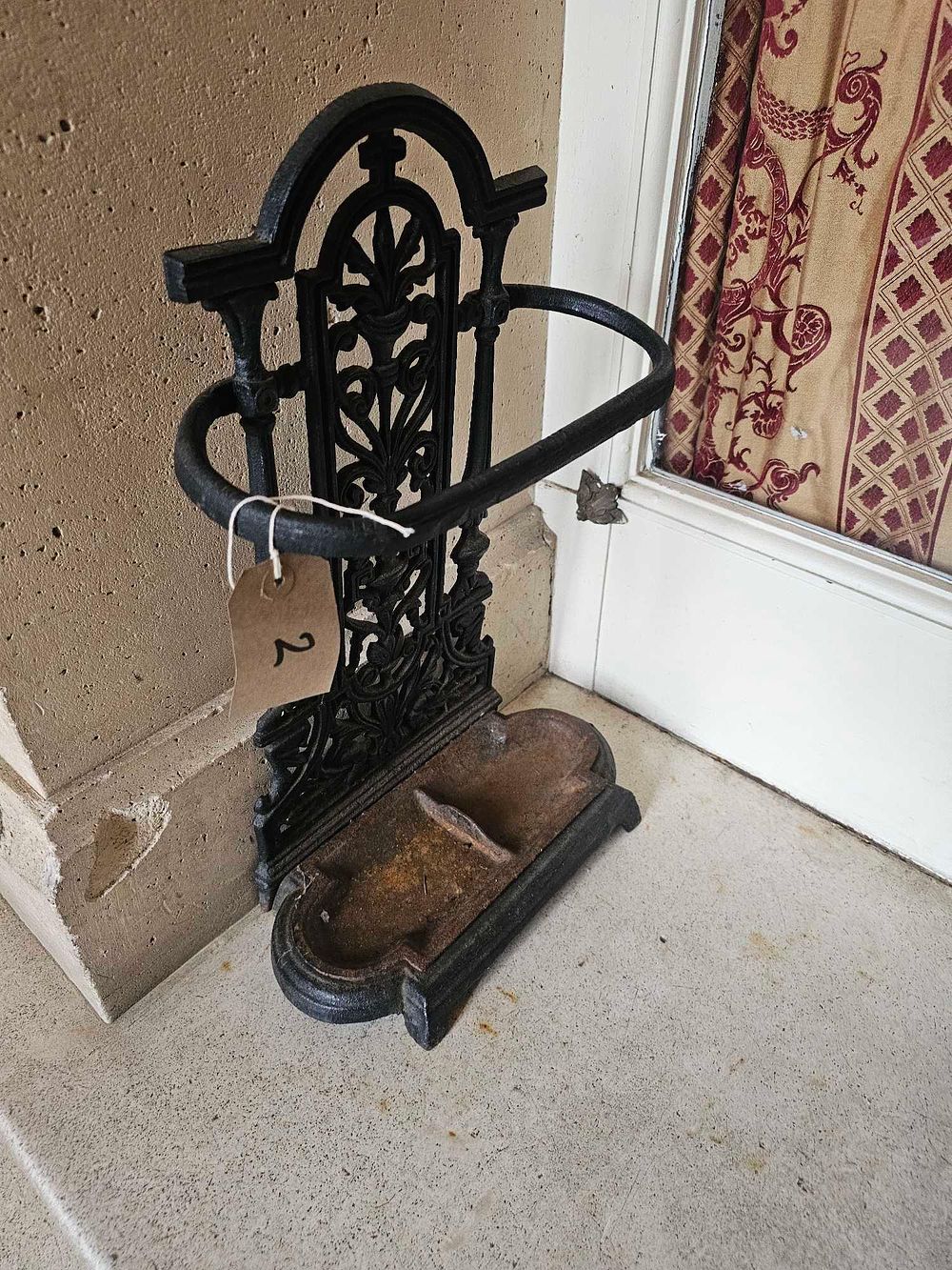 Lot 2: A Victorian Ornate Cast Iron Umbrella and Stick Stand