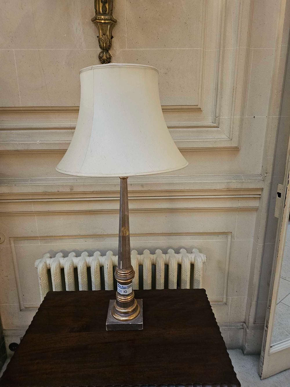 Lot 10: A Neoclassical Style Ebonized and Gilt Column Table Lamp