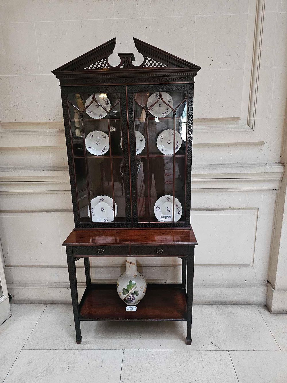 Lot 13: An Edwardian English Mahogany Display Cabinet-on-Stand, in the Manner of Thomas Chippendale, Circa 1900
