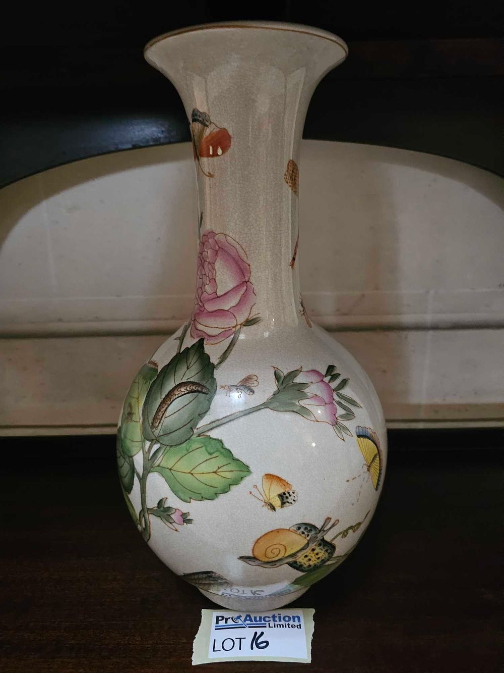 Lot 16: A Chinese Famille Rose Enameled Crackle Glaze Baluster Vase, 20th Century