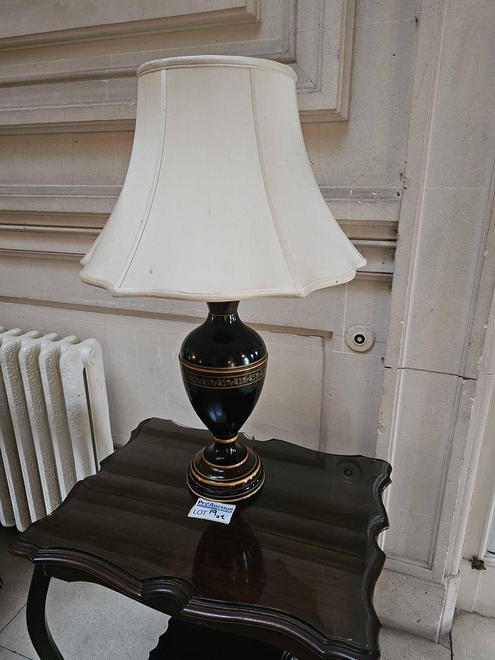 Lot 19: A Mid-20th Century Black and Gilt Neoclassical Style Table Lamp