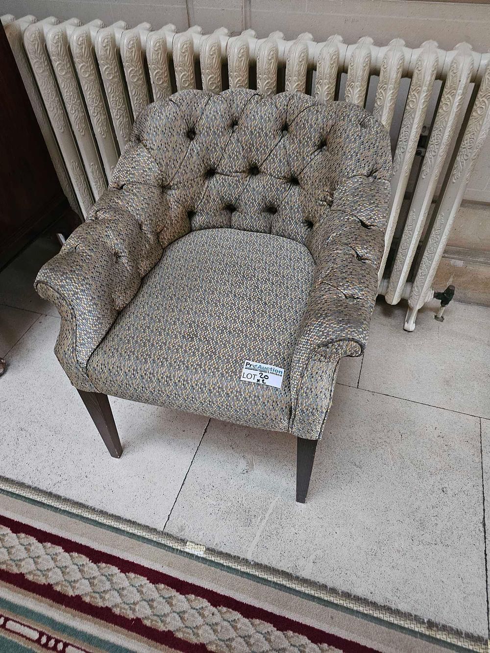 Lot 20: A Mid-20th Century Style Button-Tufted Tub Armchair