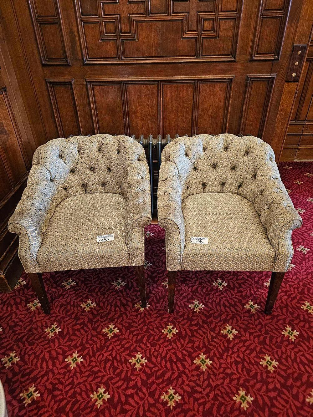 Lot 36: A Pair of Upholstered Button-Tufted Club Chairs