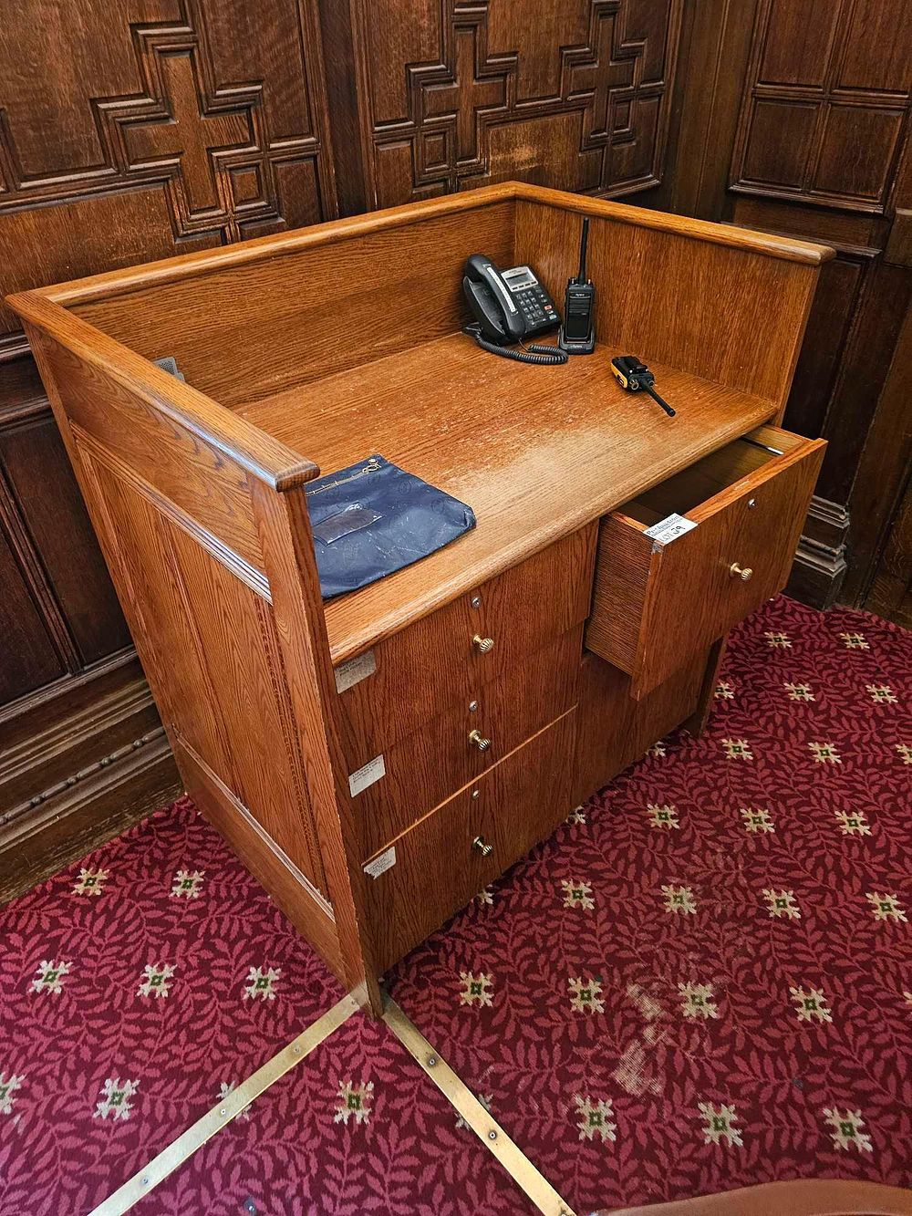 Lot 39: A Traditional Oak Reception or Courtroom Desk, Mid-20th Century Style