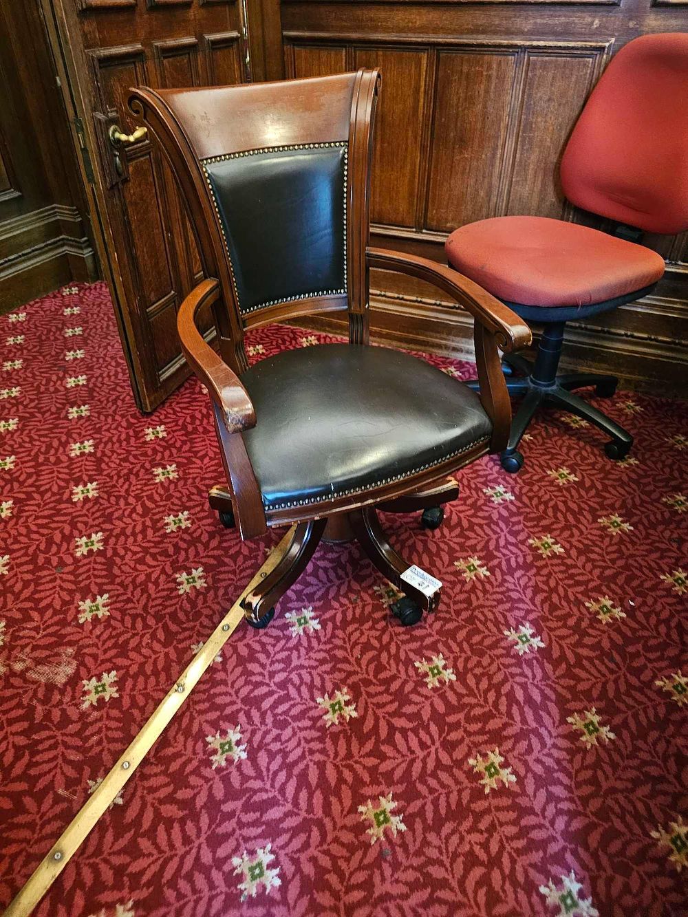Lot 41: An Executive-Style Swivel Office Chair, Dark-Stained Wood and Leather or Faux Leather