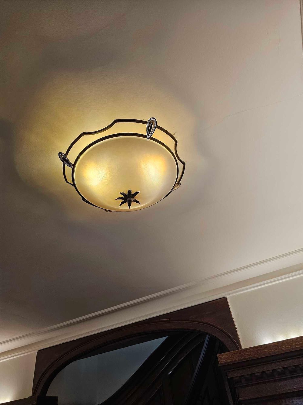 Lot 44: An Art Deco Style Bronze and Frosted Glass Flush-Mount Ceiling Light