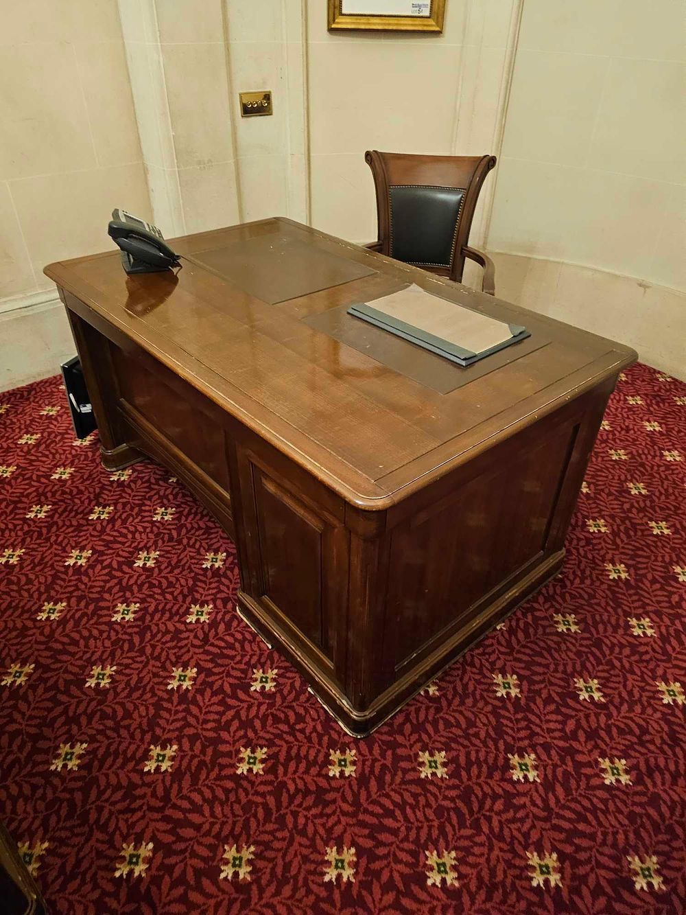 Lot 47: A Traditional Executive Desk and Office Chair