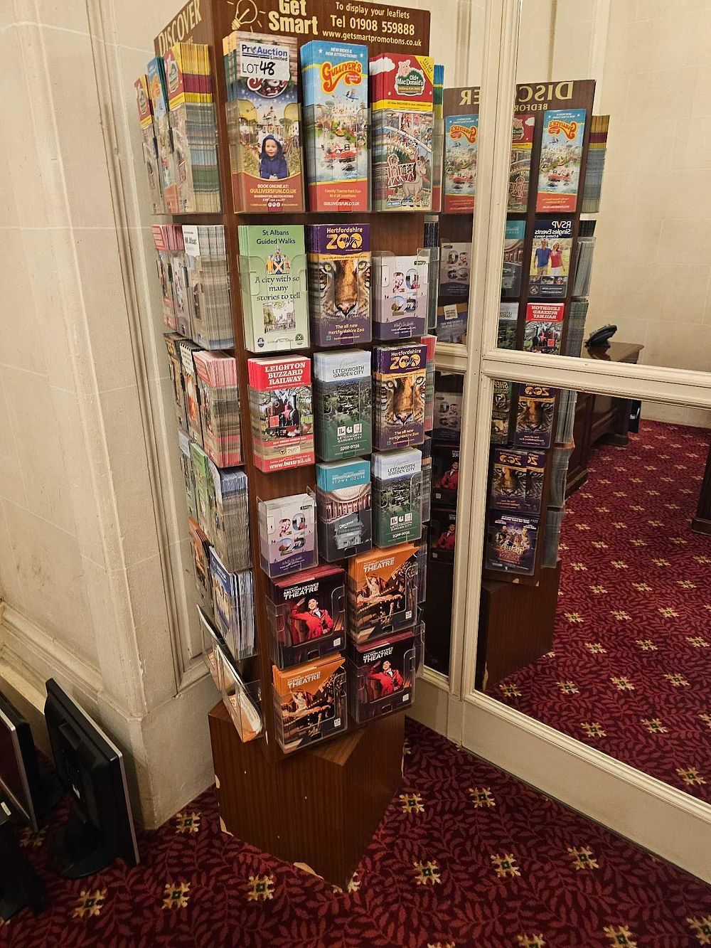 Lot 48: A Contemporary Wooden and Acrylic Rotating Promotional Leaflet Display Rack