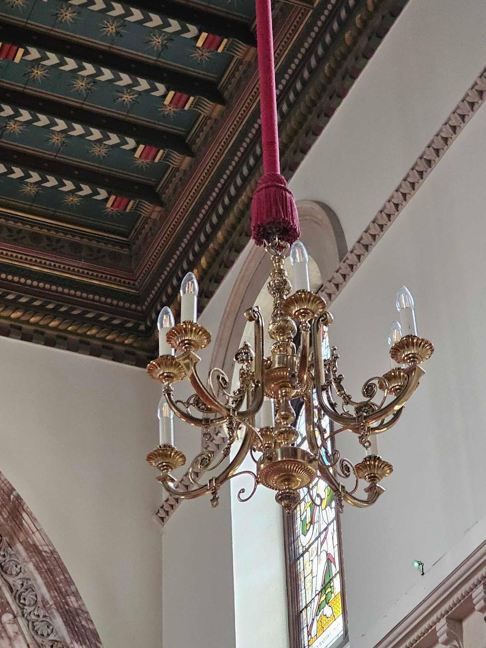 Lot 65: A Late 19th / Early 20th Century Brass or Bronze Eight-Light Chandelier