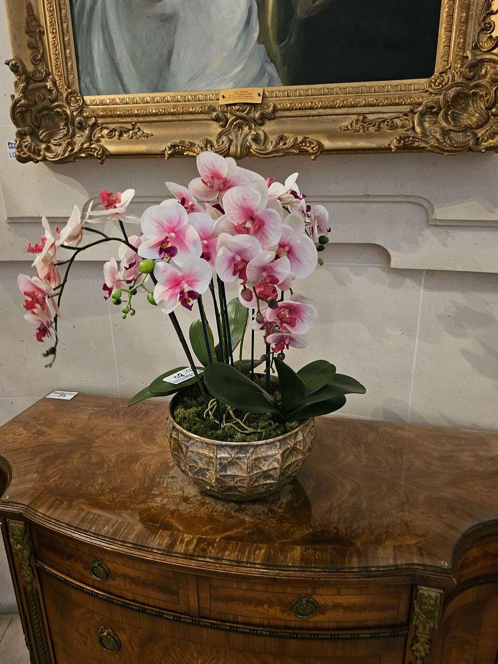 Lot 80: A Faux Phalaenopsis Orchid Arrangement in a Patinated Metallic Planter