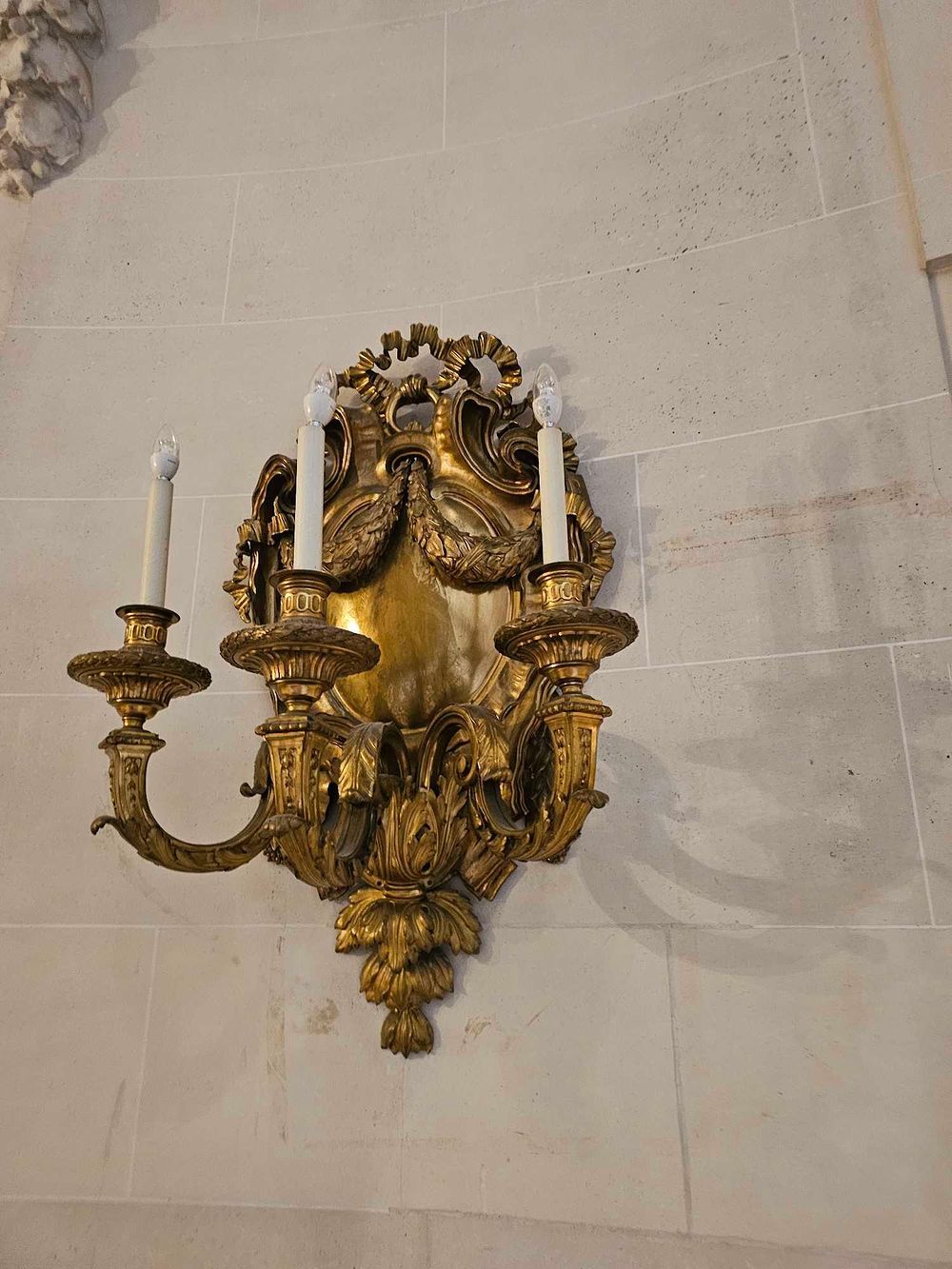Lot 83: A French Louis XVI Style Gilt Bronze Three-Light Wall Sconce